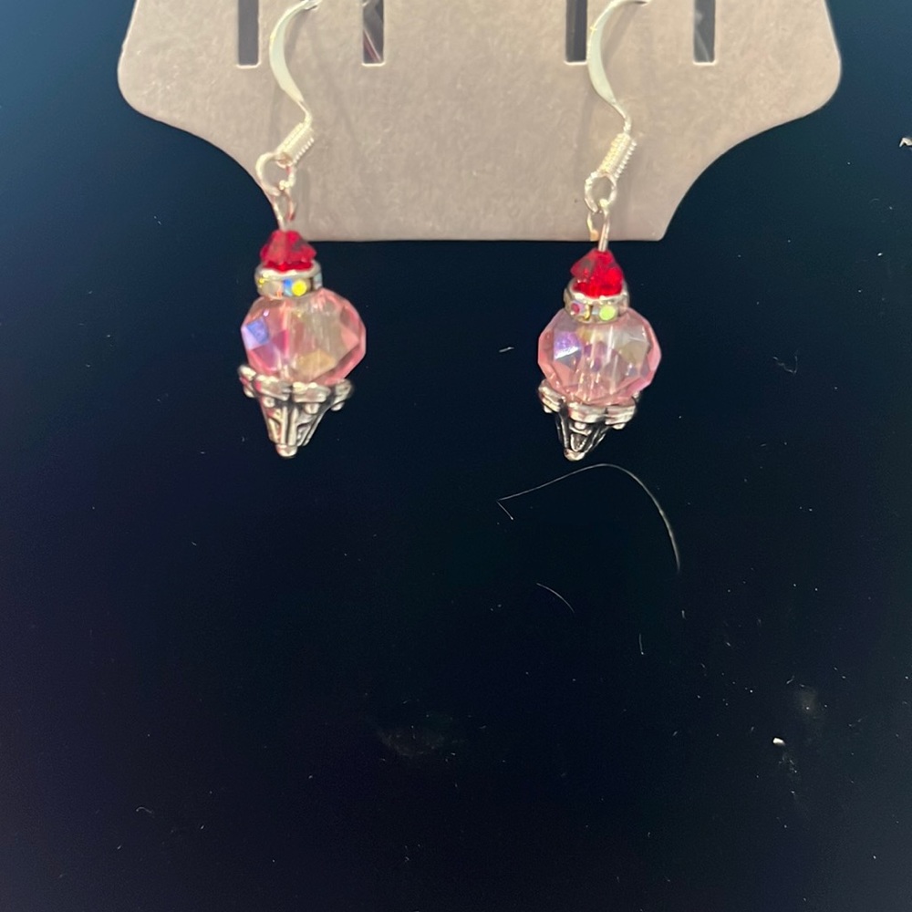 Pink ice cream earrings with whip cream and cherry on it